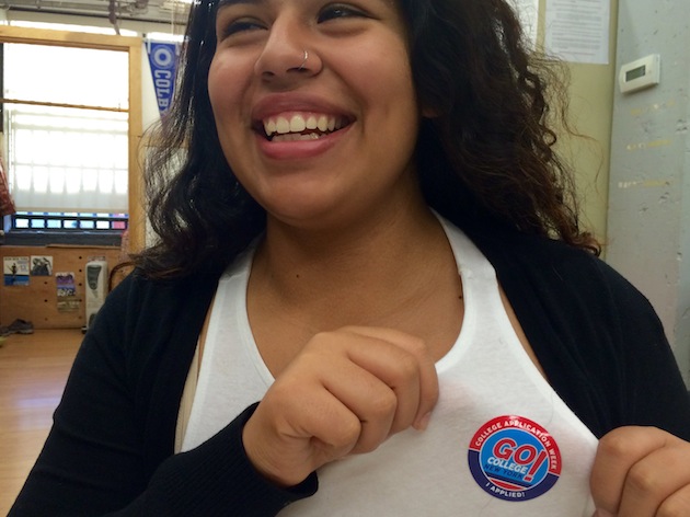 Naomi proudly displays her College Application Week sticker, showing she's applied!